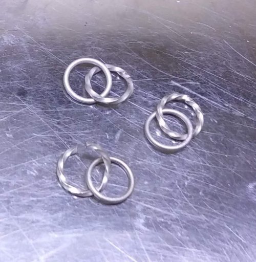 Judy Larson's Wire Links 7, 8, 9, and 10 - , Findings & Components, Toggles & Clasps, Earwire & Headpin, Butane Torch, Soldering, Solder, Open the twisted jump rings.